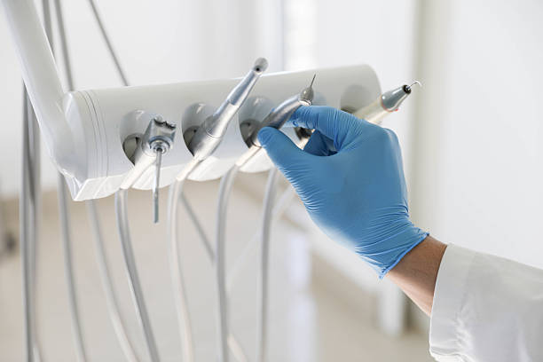 Professional Tooth Extraction technician working in Enfield, NC